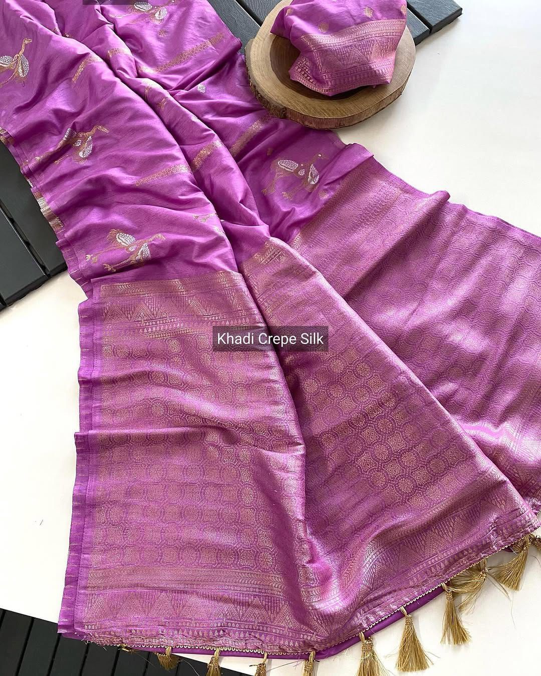 Experience the grandeur of Banarasi craftsmanship! Our stunning nylon Banarasi hand-dyed saree features: