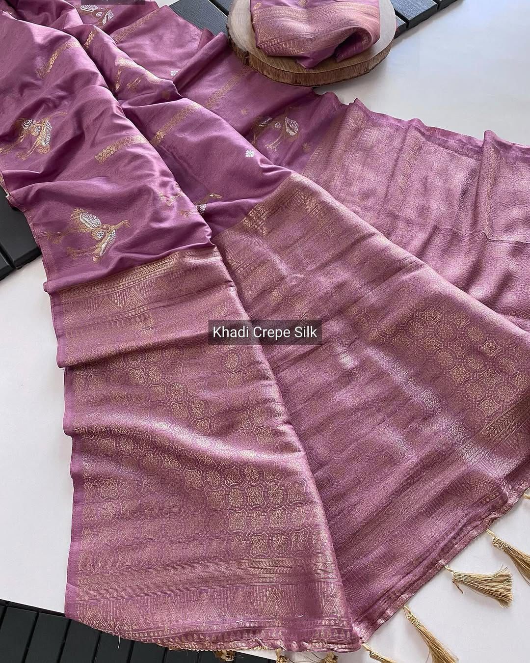 Experience the grandeur of Banarasi craftsmanship! Our stunning nylon Banarasi hand-dyed saree features: