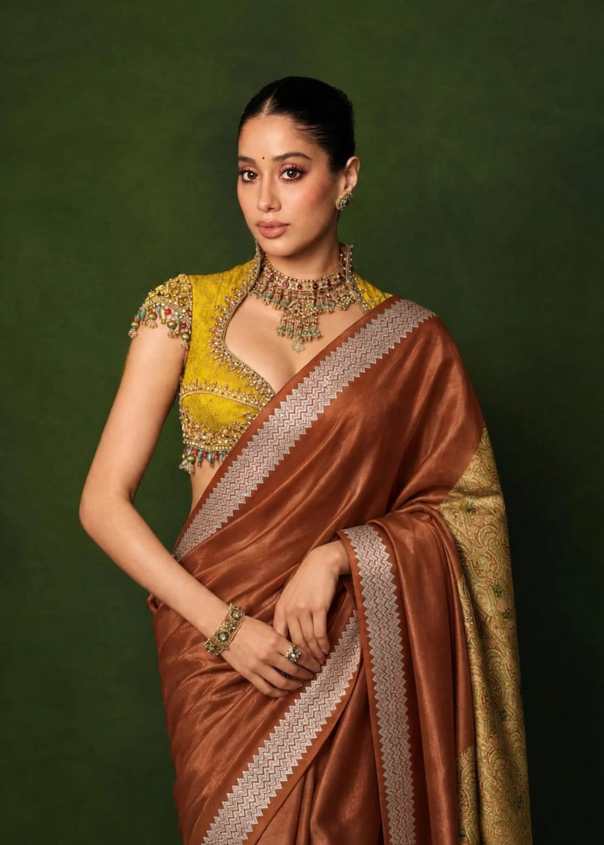Celeb inspired saree with raw silk work blouse
